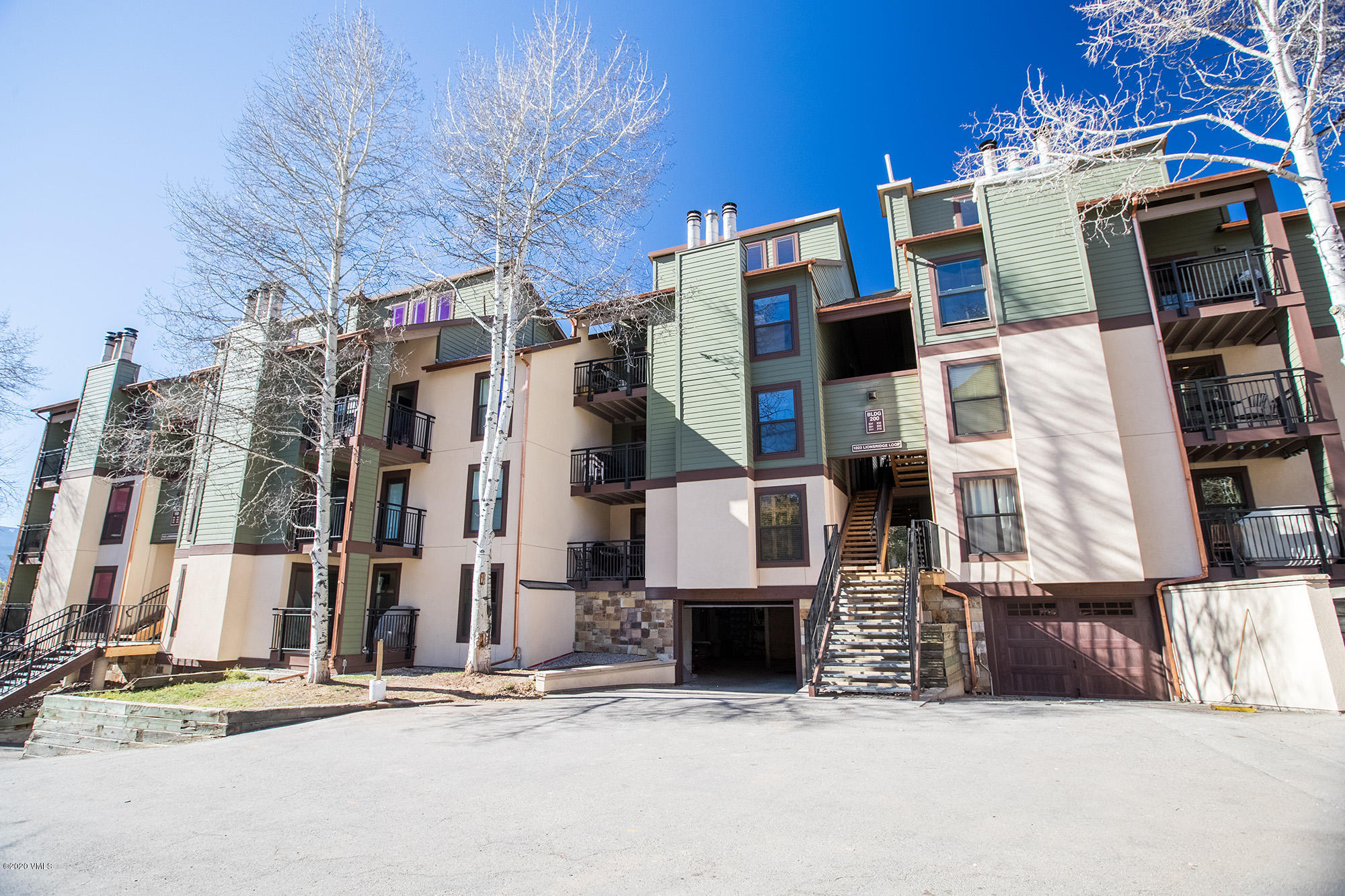 963 Lions Ridge Loop, Unit 501 Vail, CO 81657 - Photo 1 of 9 a view of a street with tall buildings
