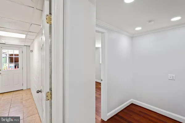 a view of storage and utility room with washer and dryer