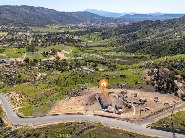 a view of a mountain with a lake view