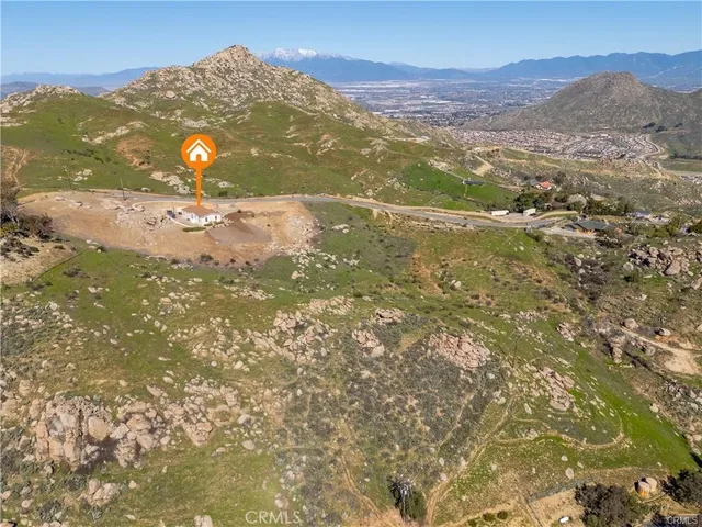 a view of a city with mountains in the background