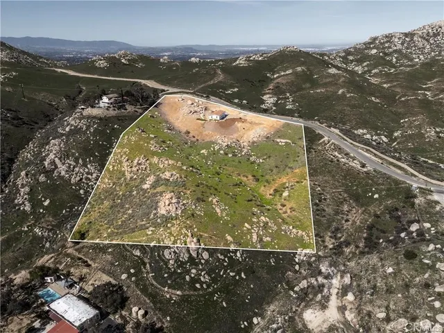 a view of balcony and yard