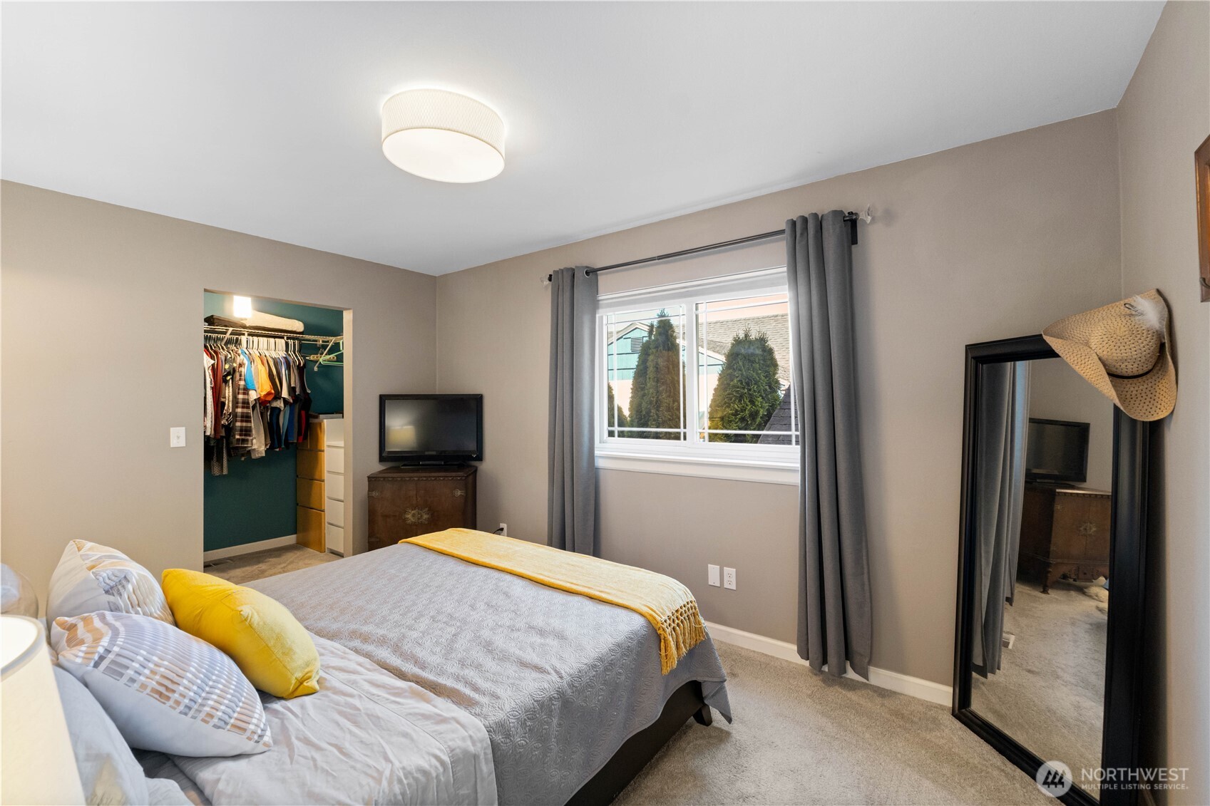 1211 Maybelle Street Sumner, WA 98390 - Photo 12 of 38 a bedroom with a bed and a window