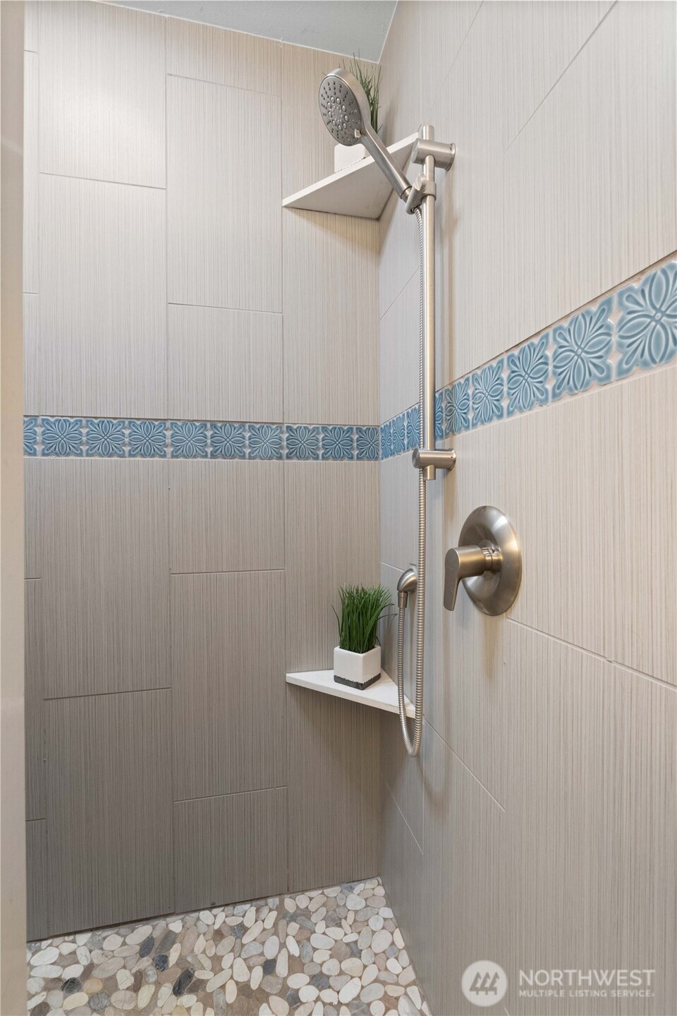 1211 Maybelle Street Sumner, WA 98390 - Photo 16 of 38 a bathroom with a shower