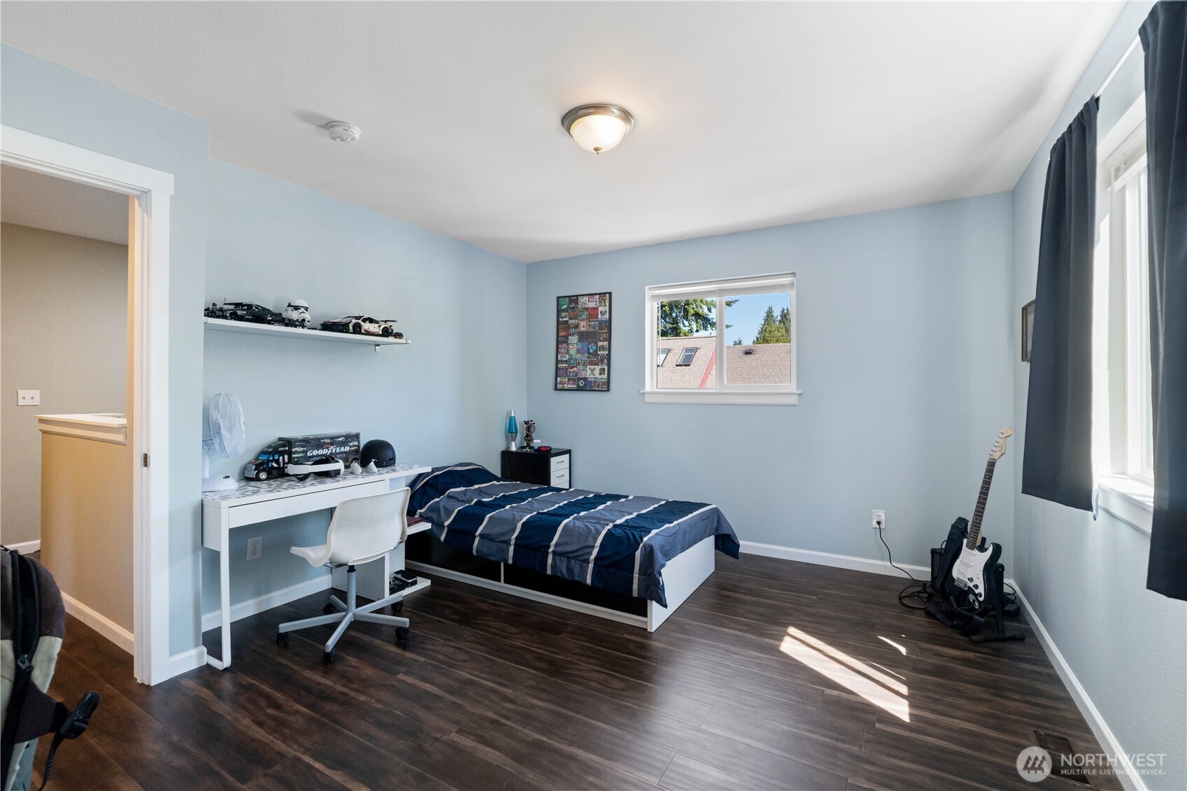 1211 Maybelle Street Sumner, WA 98390 - Photo 23 of 38 a bedroom with a bed and a window