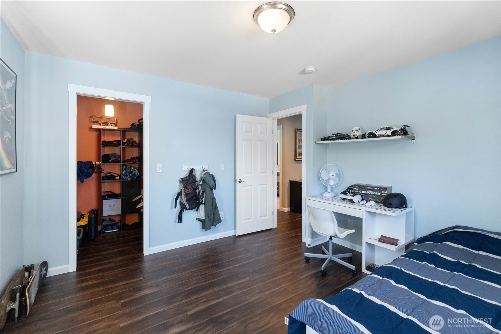 1211 Maybelle Street Sumner, WA 98390 - Photo 24 of 38 a view of a workspace with furniture and wooden floor