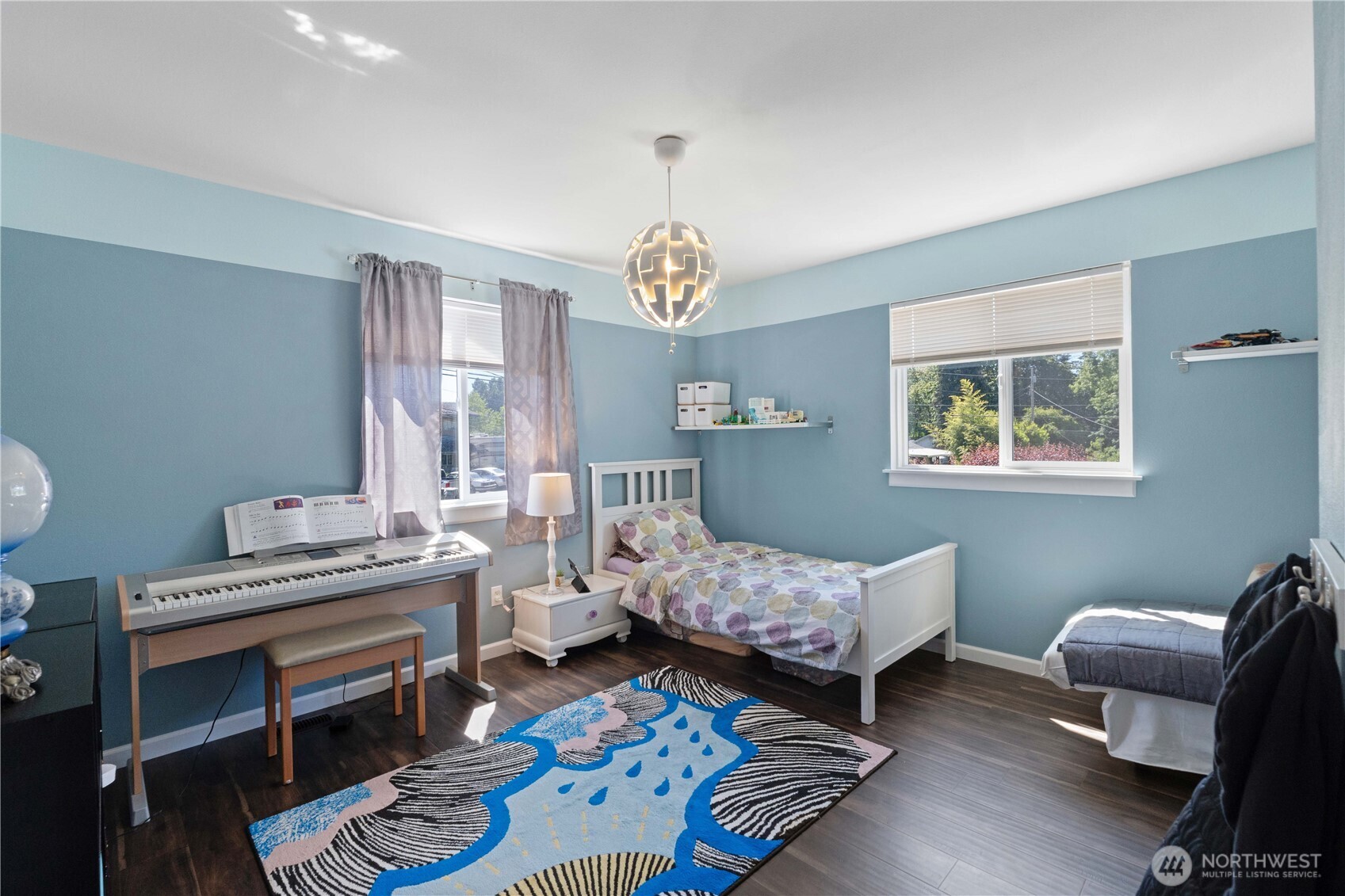 1211 Maybelle Street Sumner, WA 98390 - Photo 25 of 38 a bedroom with furniture and a window