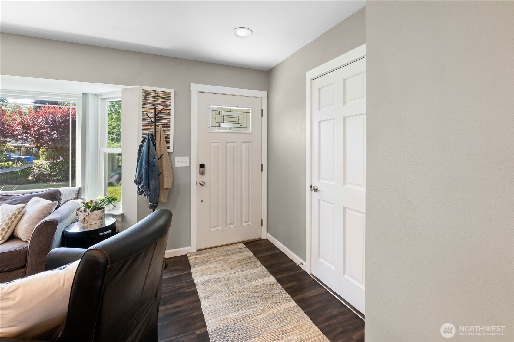 1211 Maybelle Street Sumner, WA 98390 - Photo 3 of 38 a living room with furniture and a gate