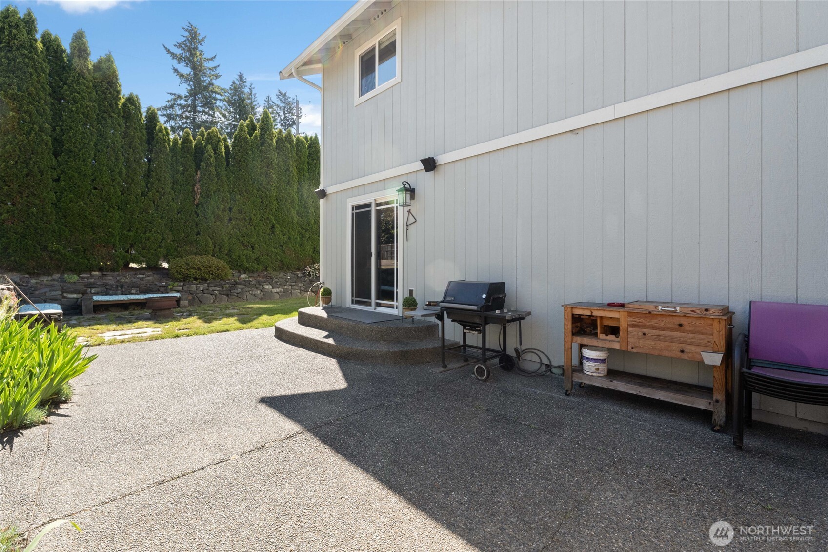 1211 Maybelle Street Sumner, WA 98390 - Photo 31 of 38 a swimming pool with outdoor seating and yard