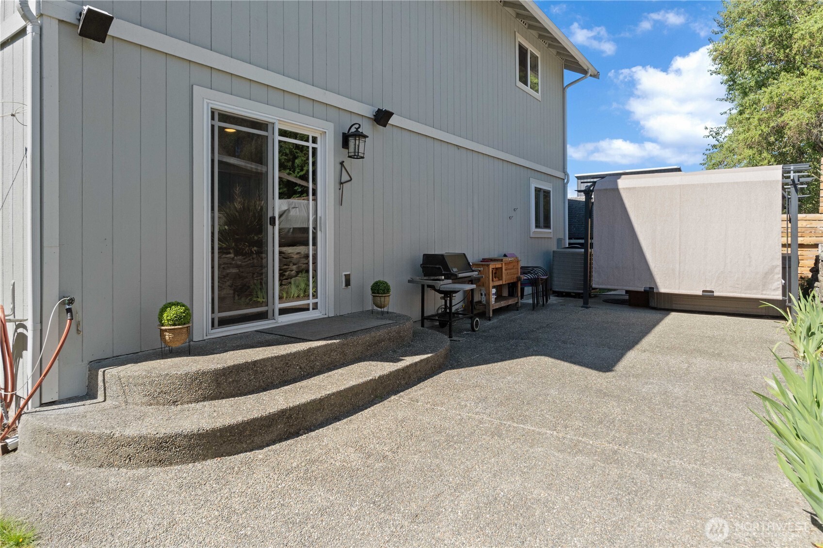 1211 Maybelle Street Sumner, WA 98390 - Photo 32 of 38 a view of a house with sitting area and porch