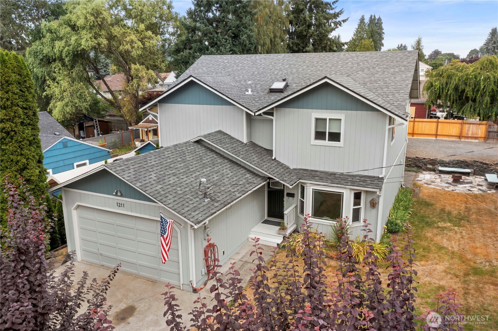 1211 Maybelle Street Sumner, WA 98390 - Photo 36 of 38 front view of house with a yard
