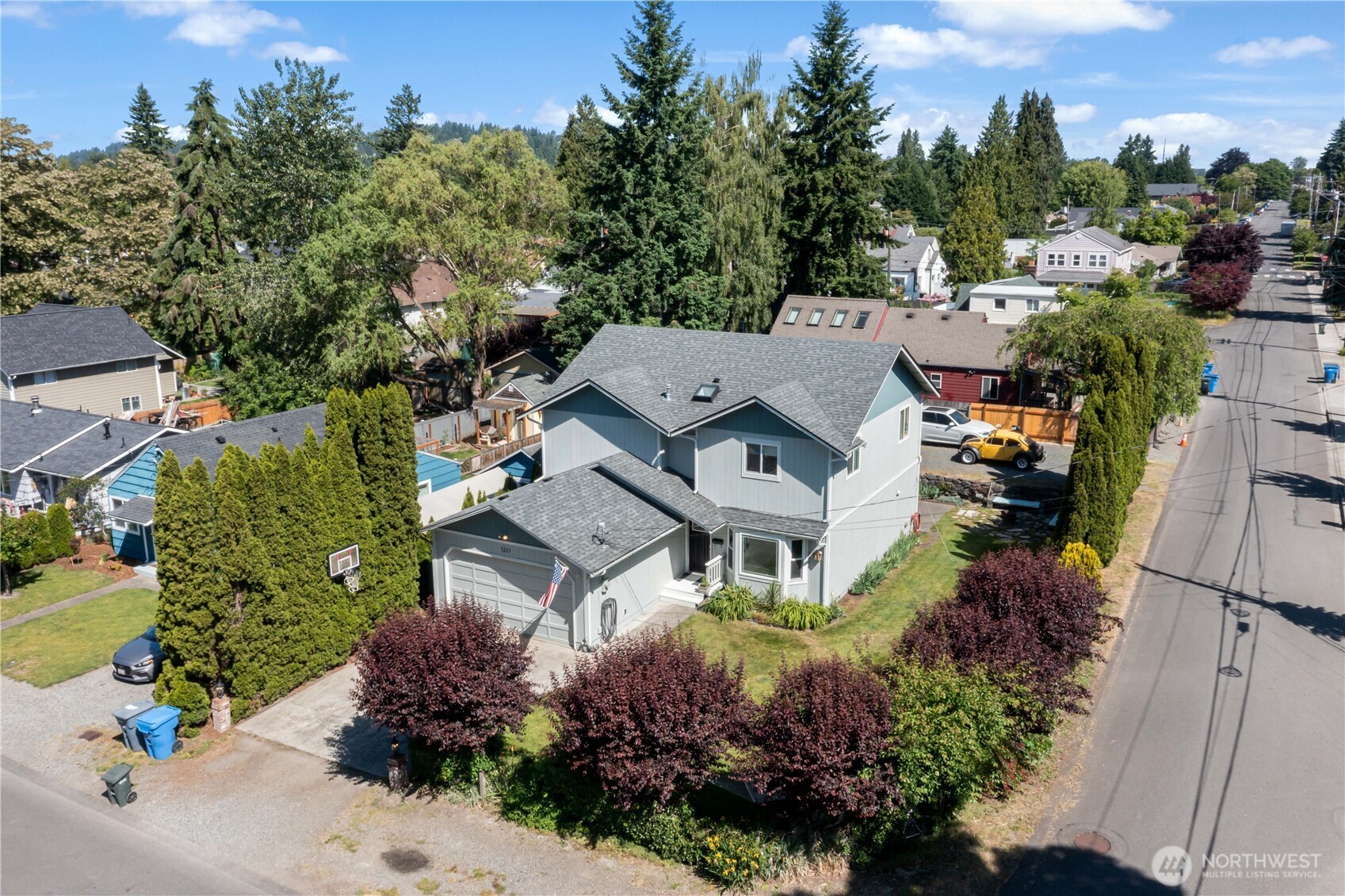 1211 Maybelle Street Sumner, WA 98390 - Photo 37 of 38 an aerial view of a house with a garden