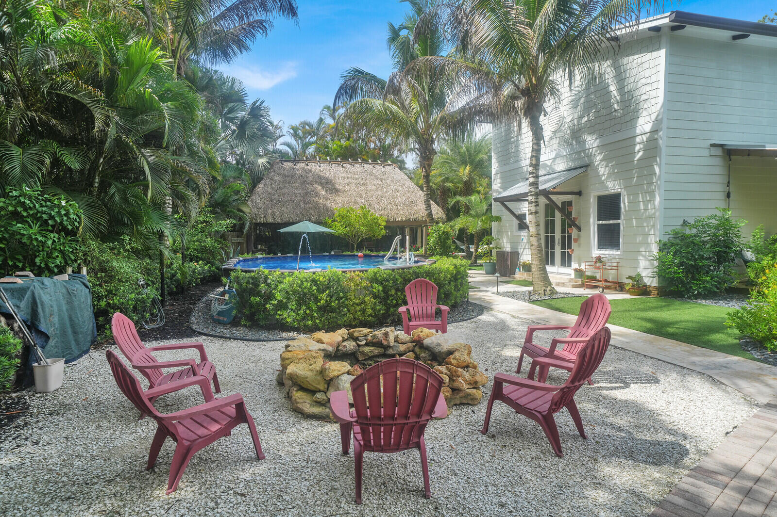 13432 153rd Road North Jupiter Farms, FL 33478 - Photo 12 of 84 Fire pit seating area