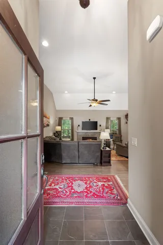 a kitchen with stainless steel appliances granite countertop a refrigerator sink and stove