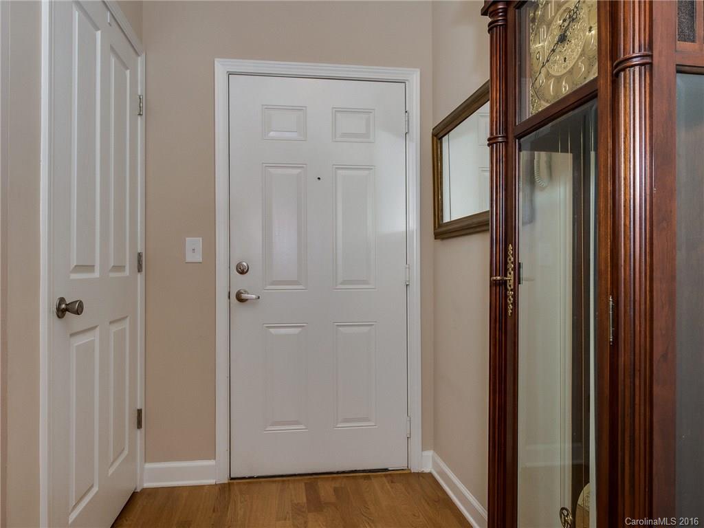 4160 Walker Road Charlotte, NC 28211 - Photo 2 of 13 a view of a hallway with wooden floor