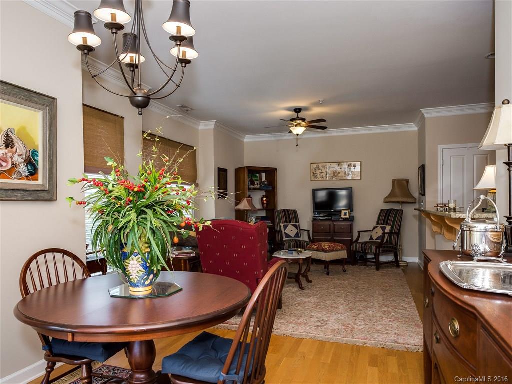 4160 Walker Road Charlotte, NC 28211 - Photo 5 of 13 a view of a dining room with furniture