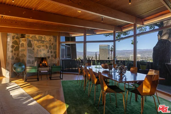 a outdoor space with lots of tables and chairs
