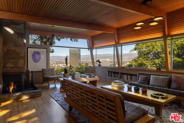 a room with furniture and a large window