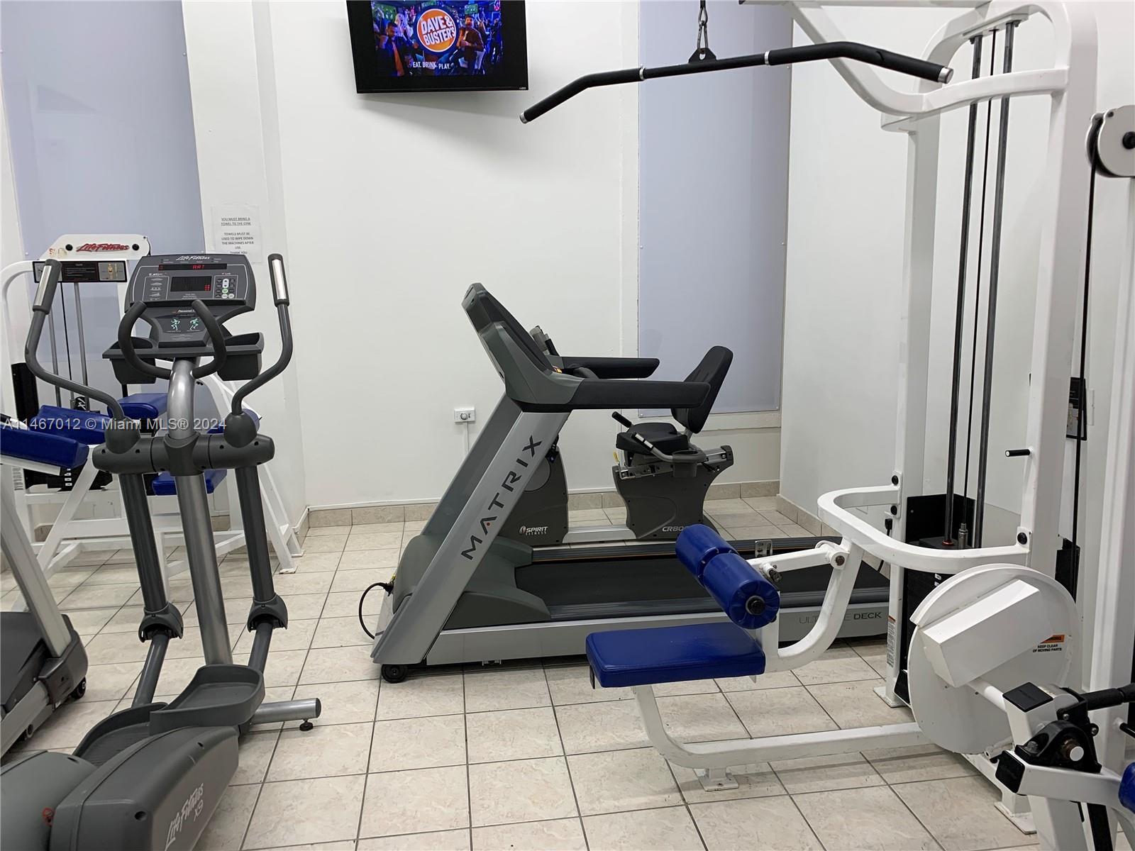 6039 Collins Avenue, Unit 1630 Miami Beach, FL 33140 - Photo 24 of 37 a living room with furniture