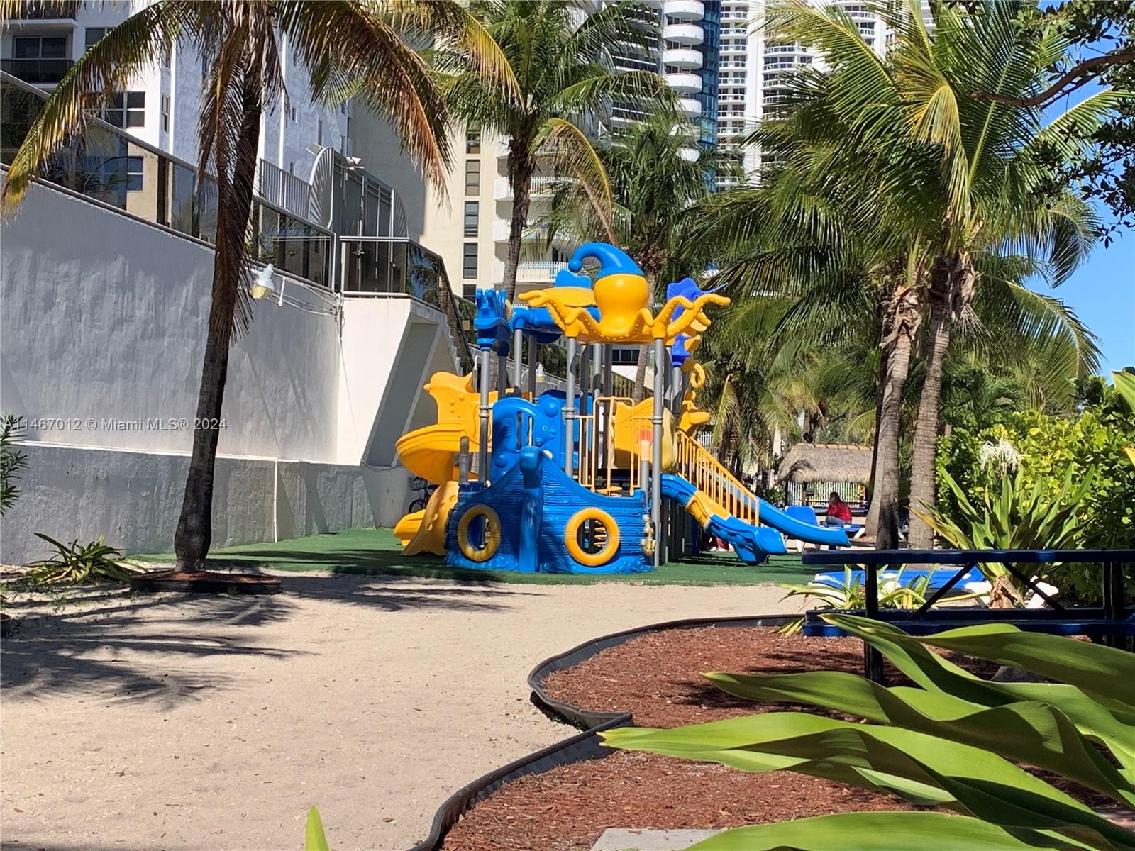 6039 Collins Avenue, Unit 1630 Miami Beach, FL 33140 - Photo 35 of 37 a view of outdoor space with garden