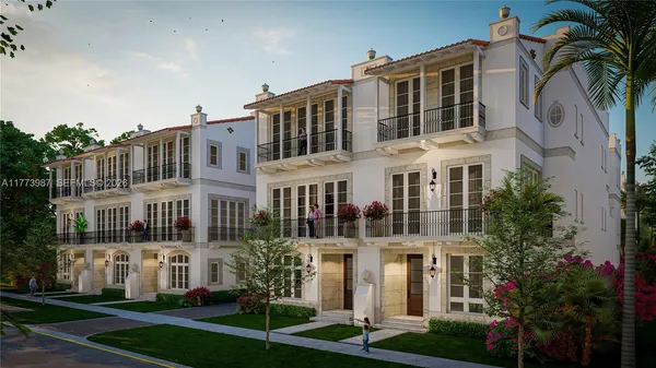 a front view of a building with garden