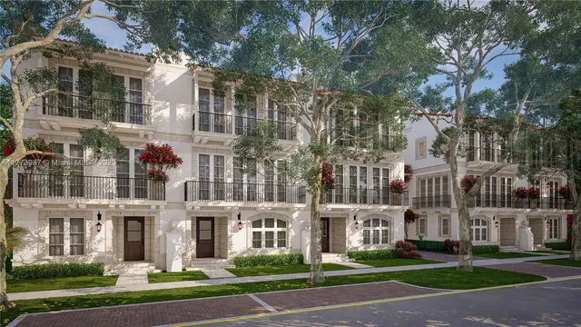 a view of a building with a yard