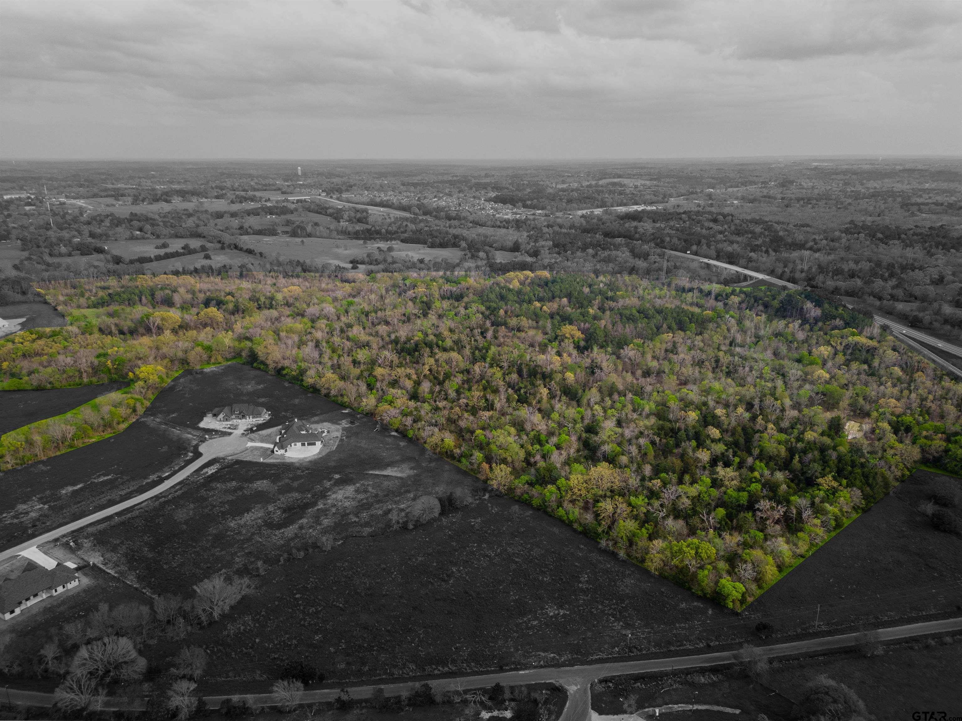 192 County Road 192 Tyler, TX 75703 - Photo 14 of 22 a view of a city street from a yard