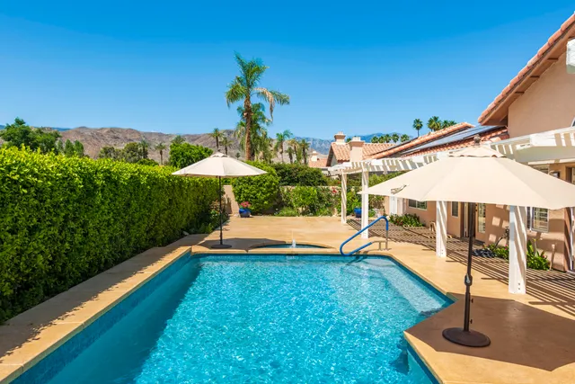 a house view with a garden space