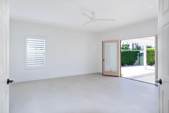 an empty room with windows