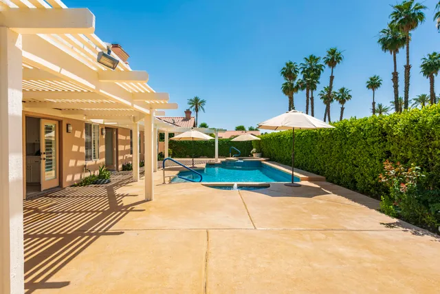 a view of a chairs and tables in the patio