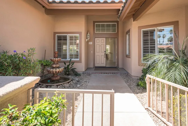 a house view with a garden space