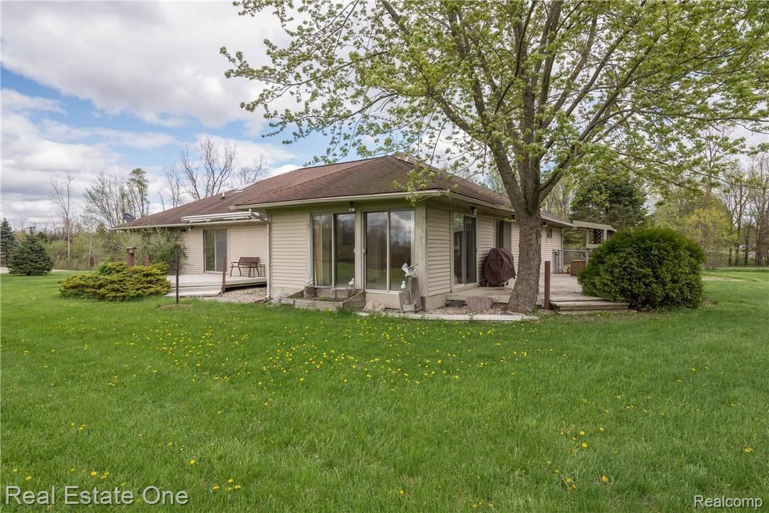 7877 North Gregory Road Fowlerville, MI 48836 - Photo 22 of 26 Natural light coming in from backyard