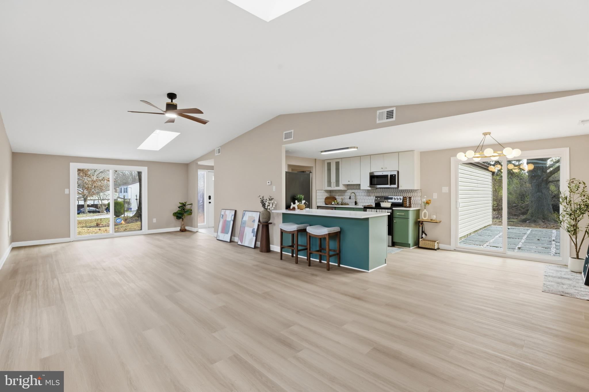 9029 Flicker Place Columbia, MD 21045 - Photo 1 of 31 Spacious, sunlit open-concept living/ dining area.