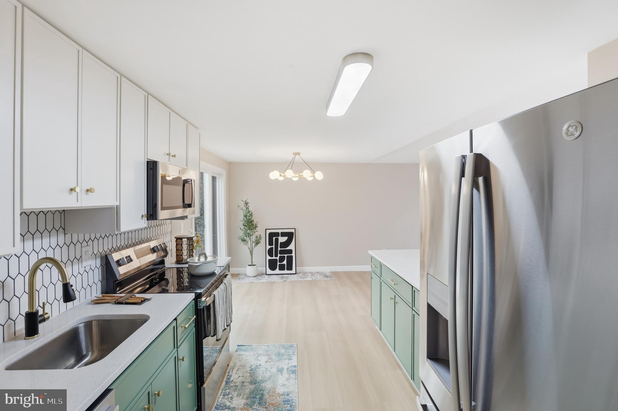 9029 Flicker Place Columbia, MD 21045 - Photo 15 of 31 Modern kitchen with stylish finishes.