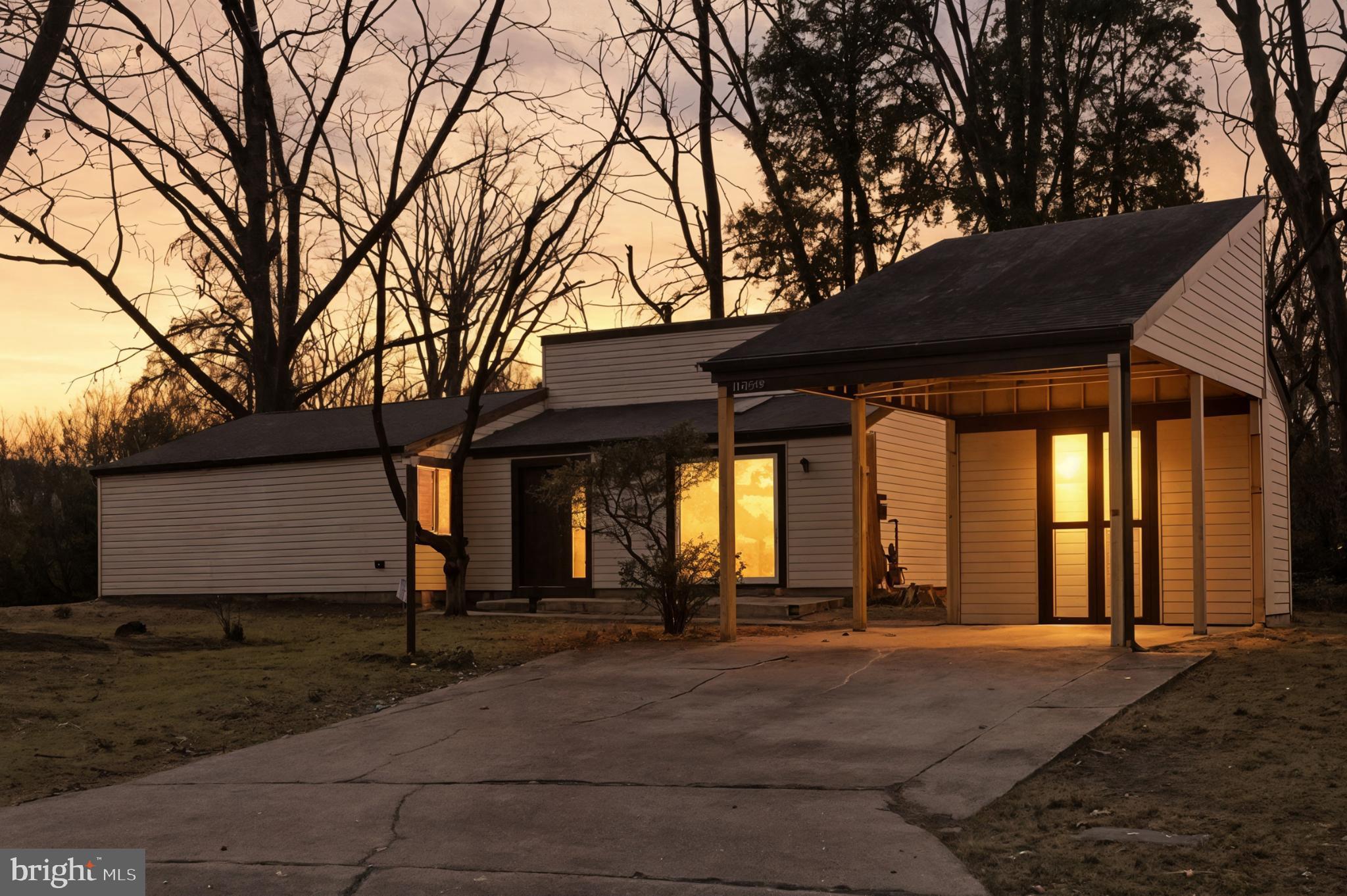 9029 Flicker Place Columbia, MD 21045 - Photo 2 of 31 Charming home aglow at sunset.