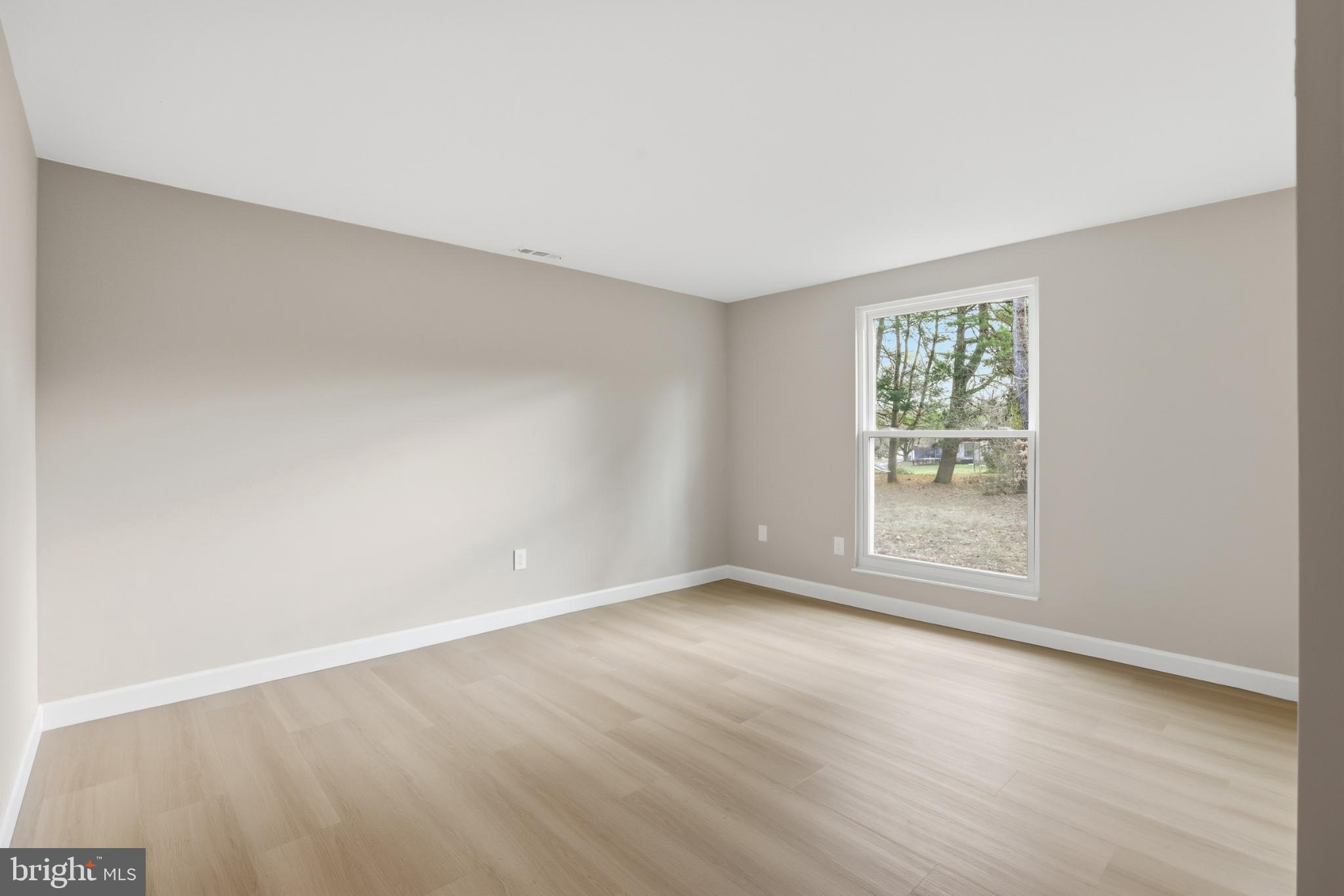 9029 Flicker Place Columbia, MD 21045 - Photo 23 of 31 Bright and airy bedroom 2 with natural light.