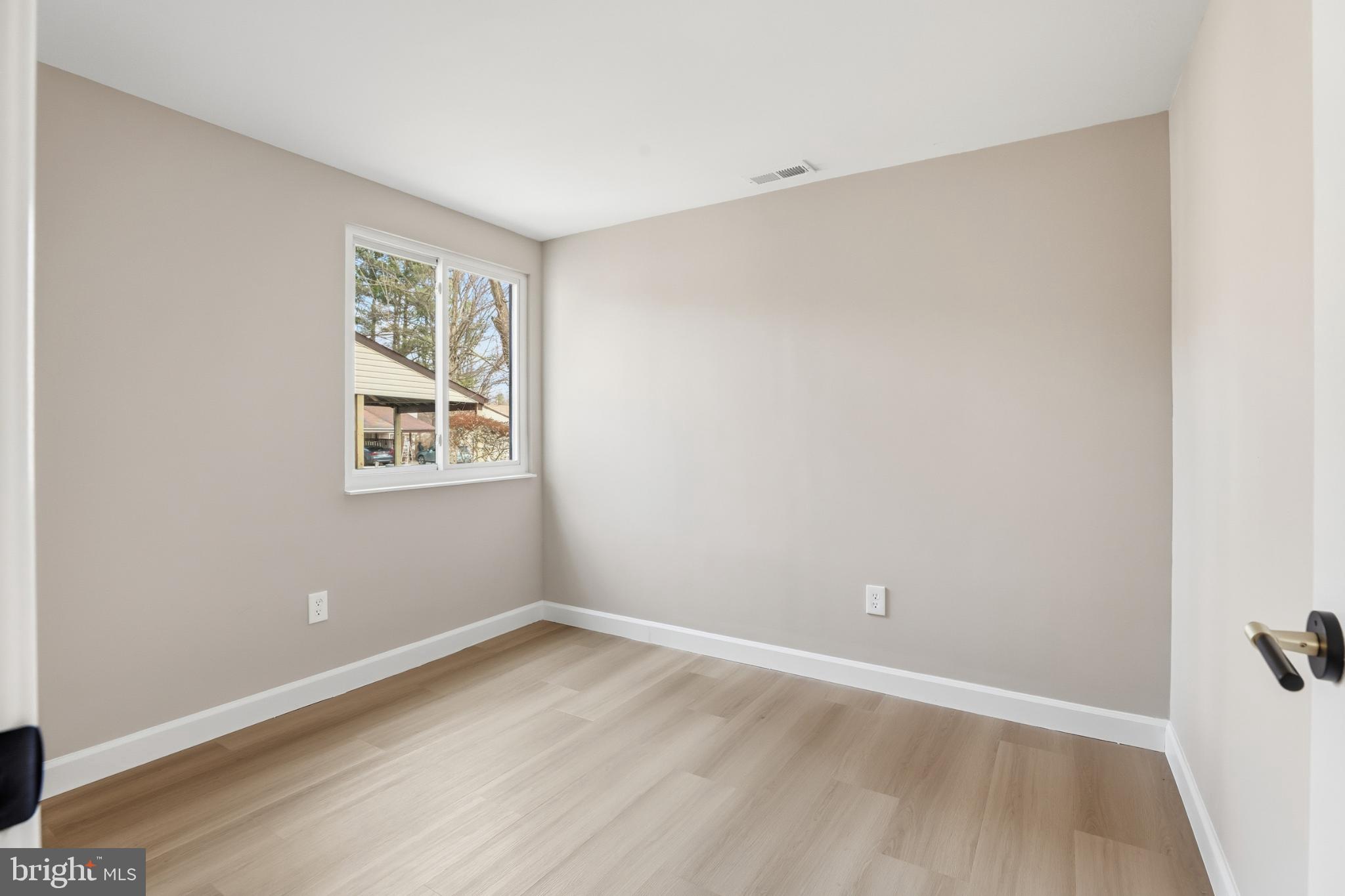 9029 Flicker Place Columbia, MD 21045 - Photo 25 of 31 Bright and airy bedroom 3 with natural light.