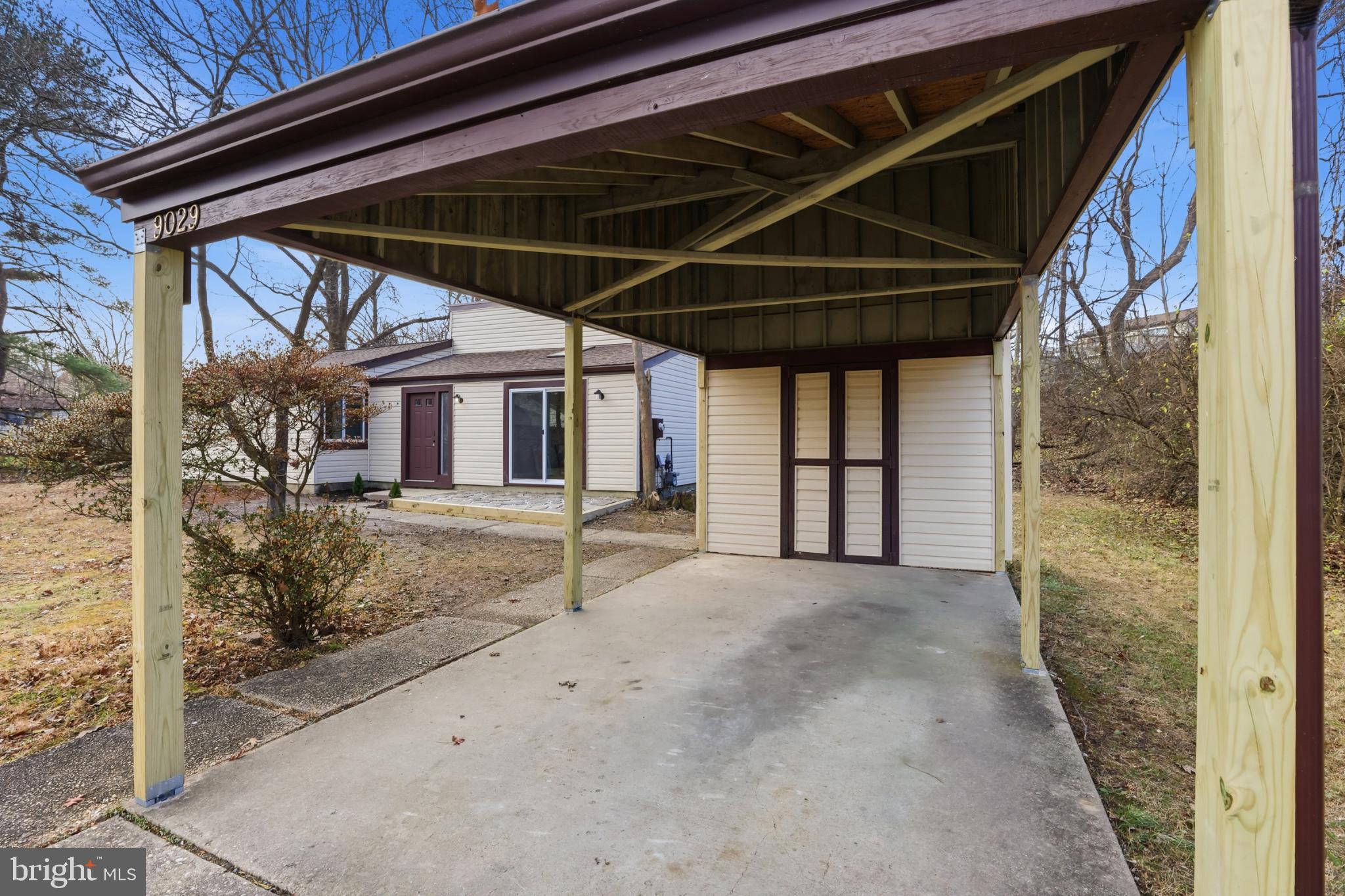 9029 Flicker Place Columbia, MD 21045 - Photo 4 of 31 Charming carport with brand new columns.