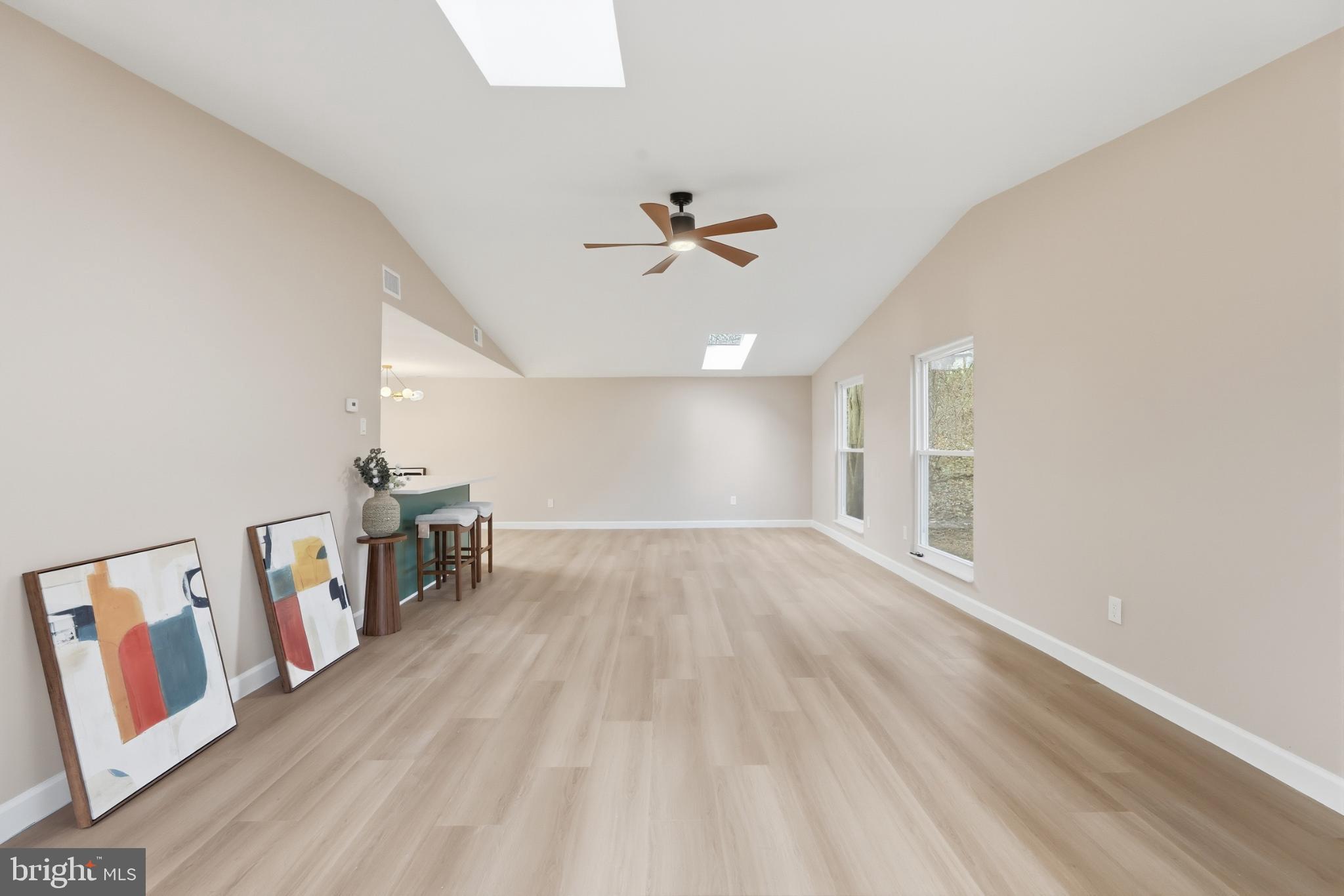 9029 Flicker Place Columbia, MD 21045 - Photo 10 of 31 Spacious, sunlit living area with modern flair.