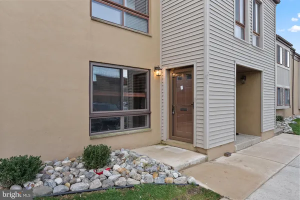 a house with garden in front of it