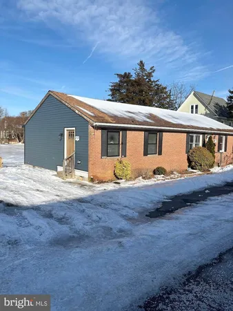 a front view of a house with yard