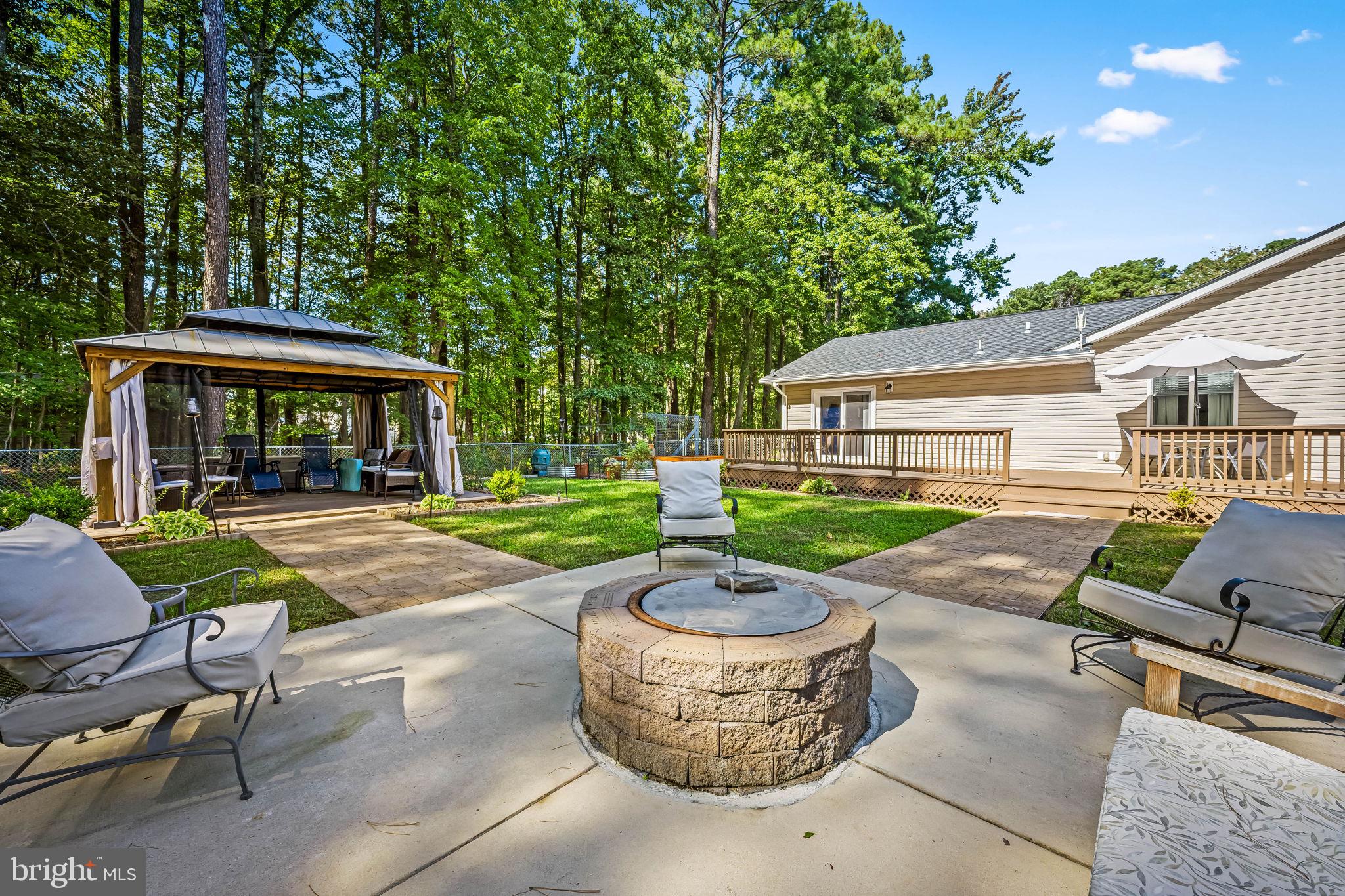 132 Talbot Road Stevensville, MD 21666 - Photo 2 of 40 Who doesn't want a fire pit in their yard?