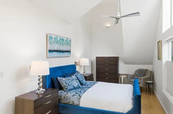 a bathroom with a sink a bathtub and a mirror