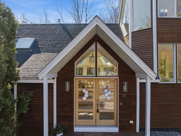 a view of balcony and yard