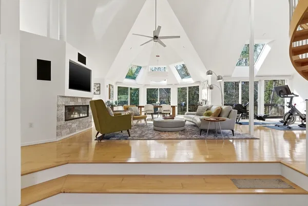 a view of living room with fireplace furniture and a flat screen tv