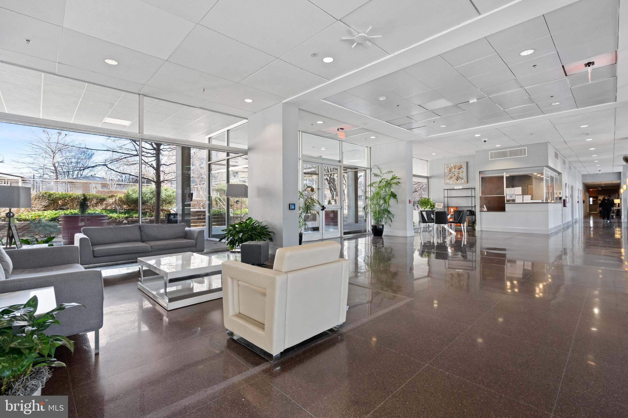 800 4th Street Southwest, Unit S421 Washington, DC 20024 - Photo 21 of 30 a living room with fireplace furniture and a large window