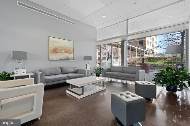 a workspace with furniture and window