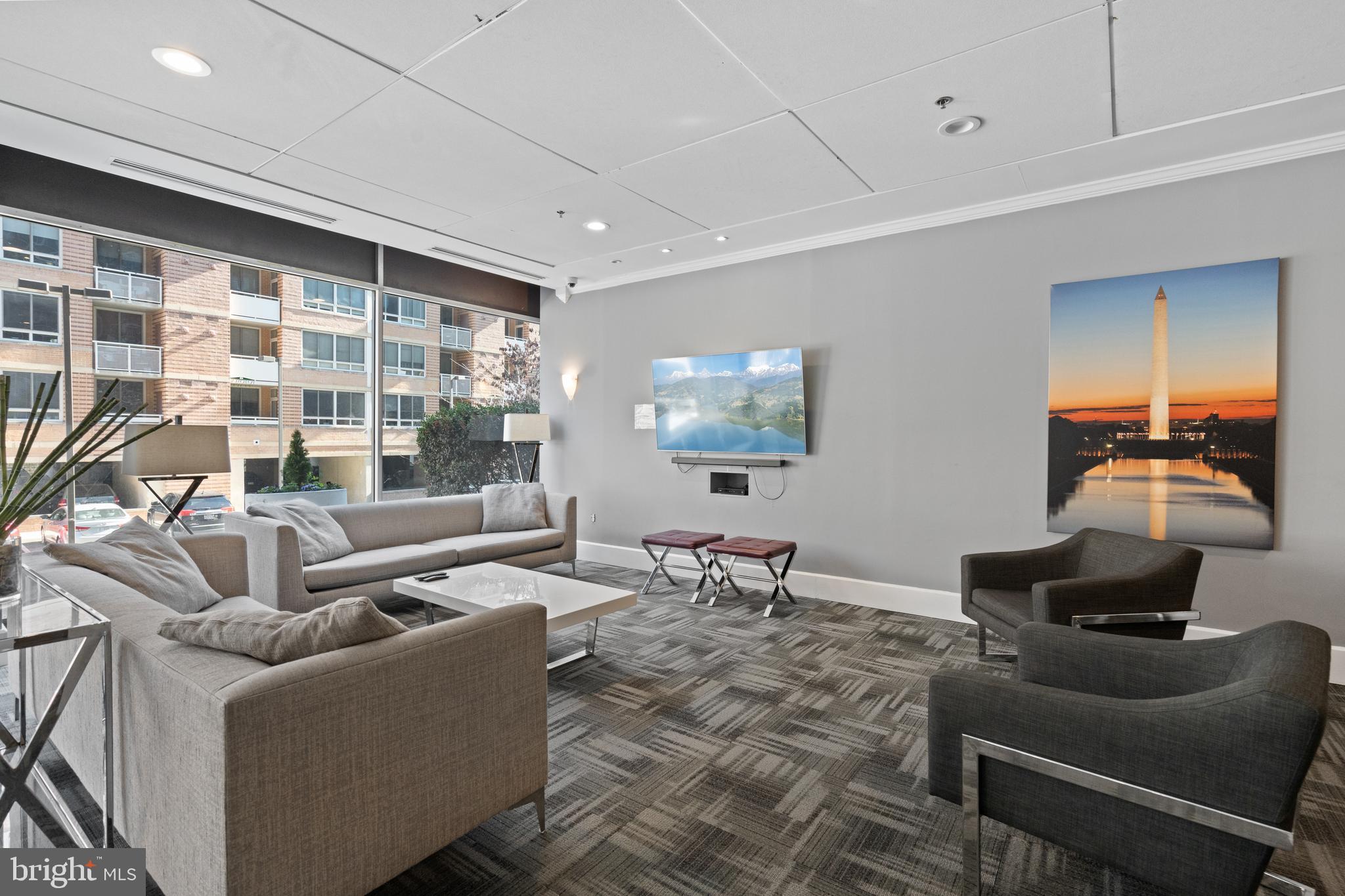 800 4th Street Southwest, Unit S421 Washington, DC 20024 - Photo 27 of 30 a living room with furniture and a large window