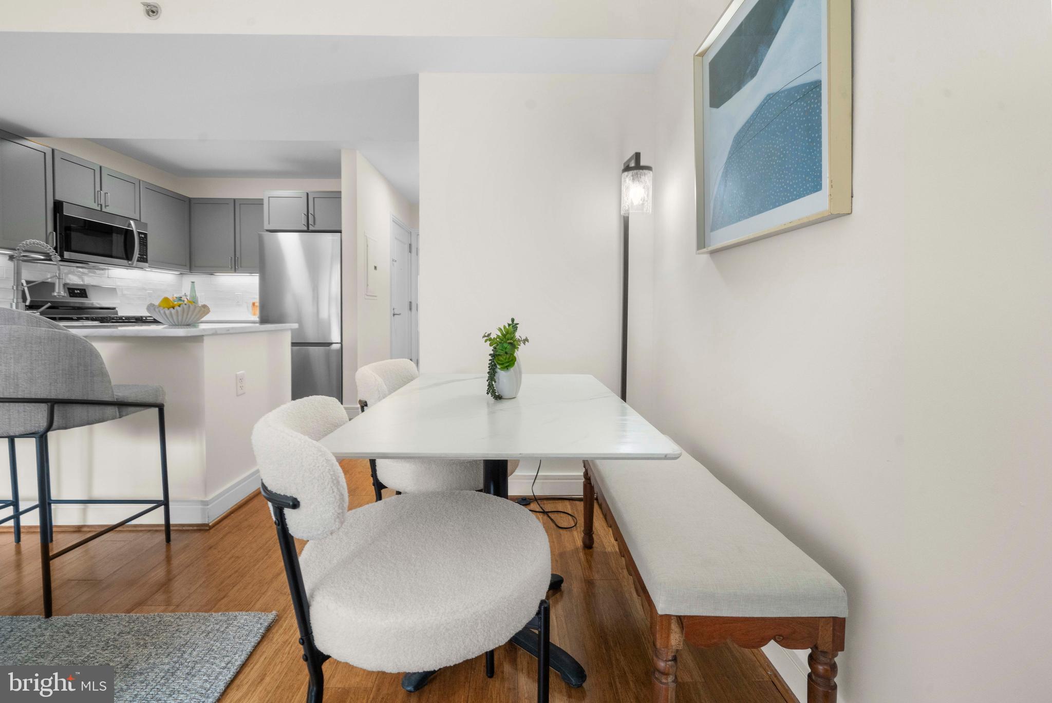 800 4th Street Southwest, Unit S421 Washington, DC 20024 - Photo 9 of 30 a view of kitchen with cabinets table and chairs