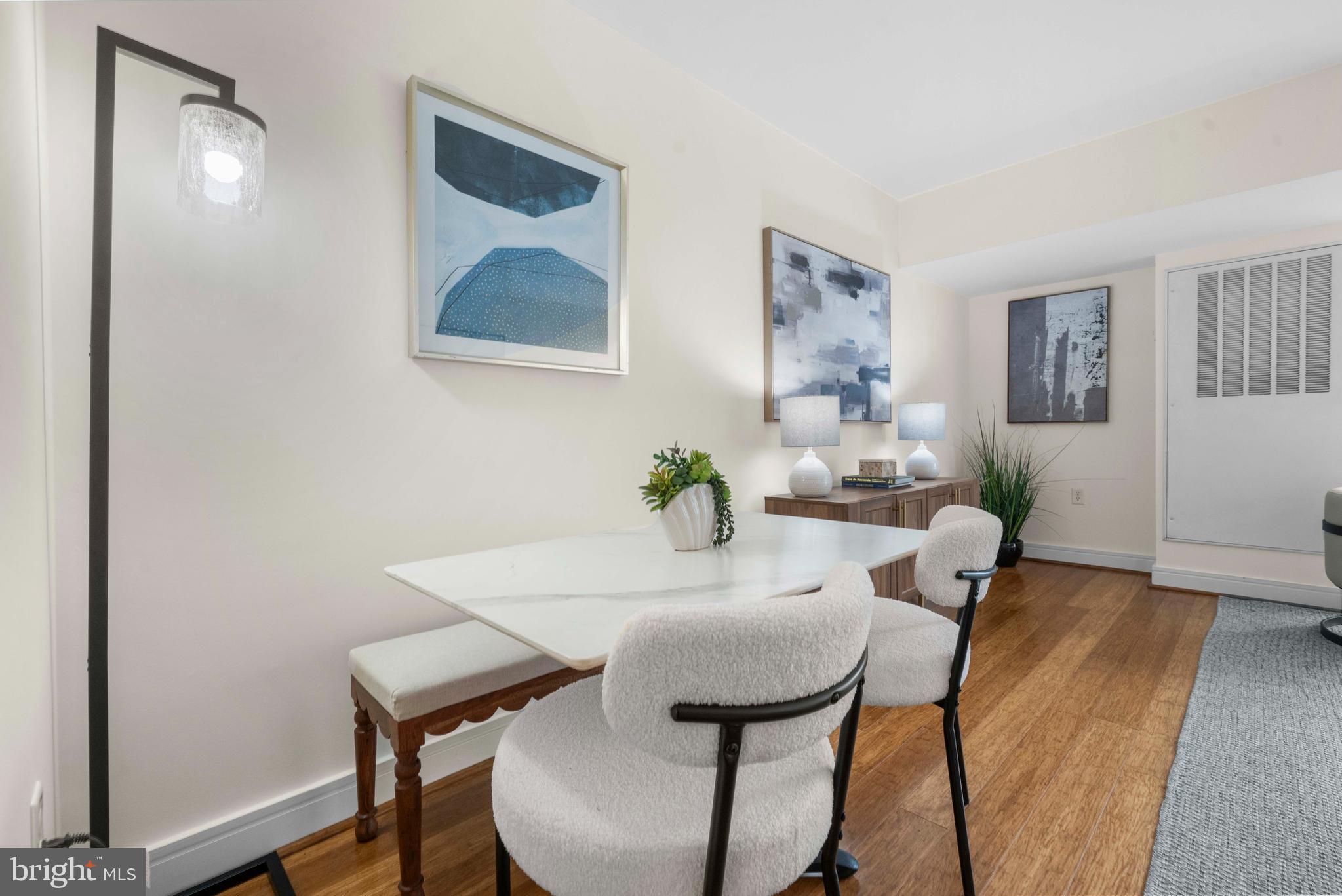 800 4th Street Southwest, Unit S421 Washington, DC 20024 - Photo 10 of 30 a dining room with furniture and wooden floor