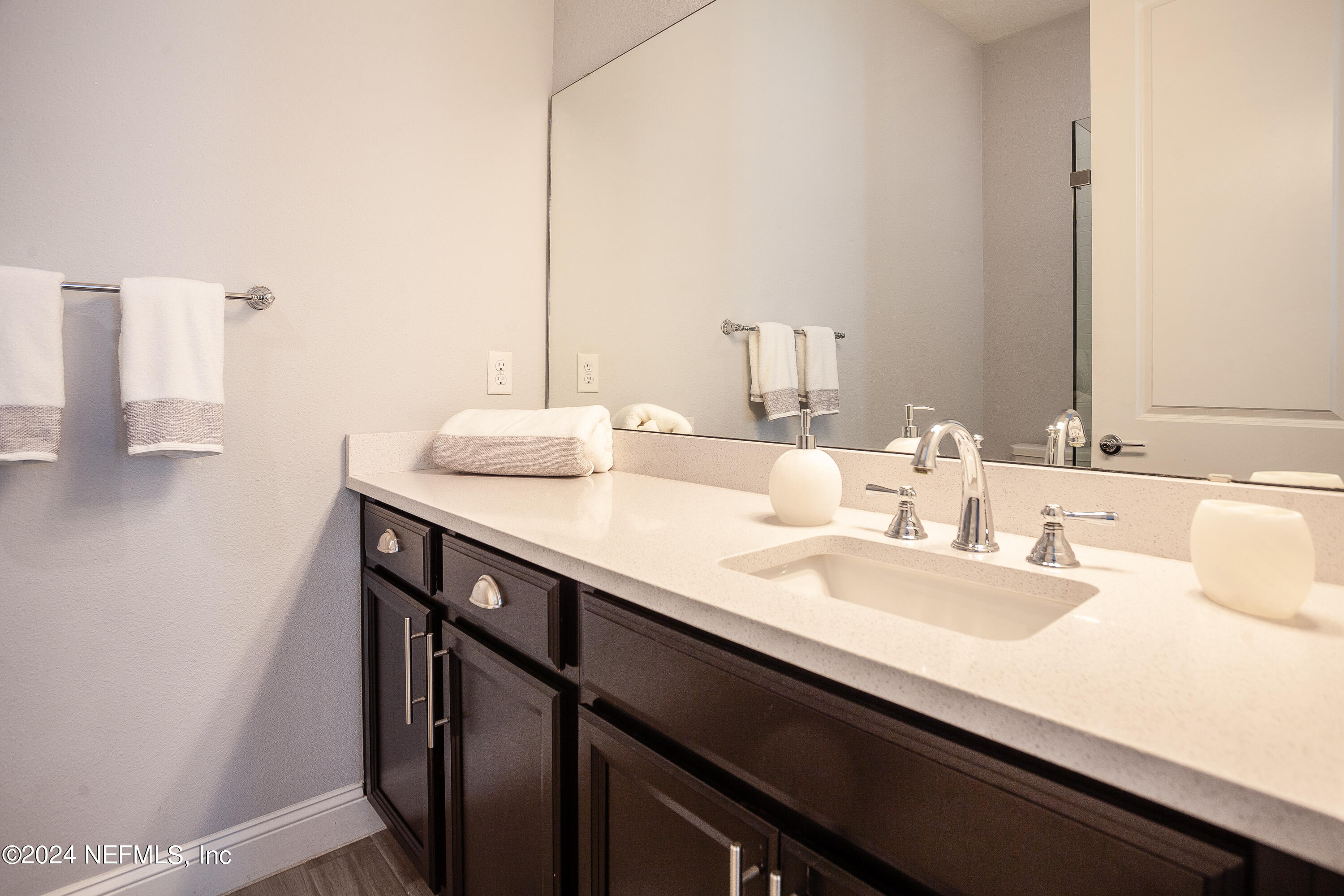 175 Caribbean Place St. Johns, FL 32259 - Photo 19 of 41 a bathroom with a double vanity sink and a mirror